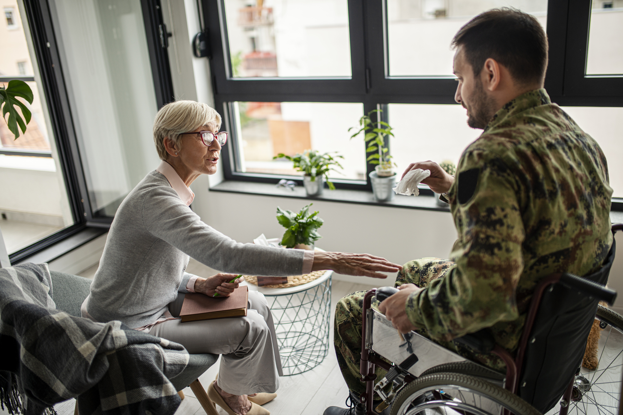 Depressed soldier and his psychotherapist during a session